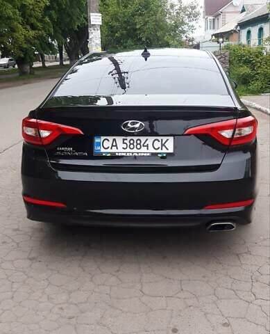 Чорний Хендай Соната, об'ємом двигуна 2.36 л та пробігом 105 тис. км за 8950 $, фото 1 на Automoto.ua