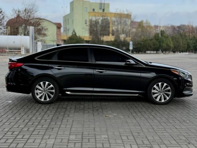 Чорний Хендай Соната, об'ємом двигуна 2.4 л та пробігом 145 тис. км за 9599 $, фото 3 на Automoto.ua
