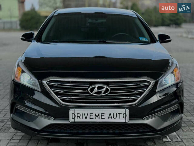 Чорний Хендай Соната, об'ємом двигуна 2.36 л та пробігом 145 тис. км за 9799 $, фото 1 на Automoto.ua