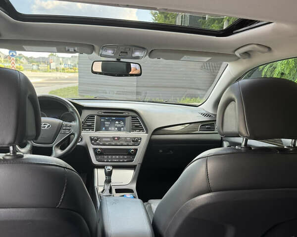 Чорний Хендай Соната, об'ємом двигуна 2.36 л та пробігом 130 тис. км за 10999 $, фото 15 на Automoto.ua