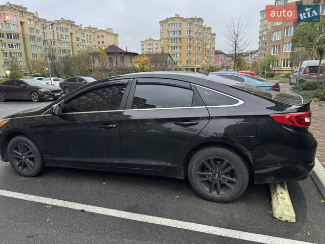 Черный Хендай Соната, объемом двигателя 2.36 л и пробегом 219 тыс. км за 10000 $, фото 3 на Automoto.ua