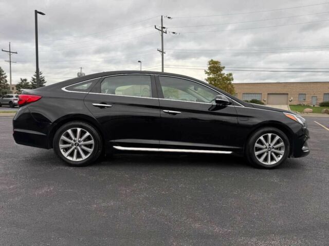 Черный Хендай Соната, объемом двигателя 2.4 л и пробегом 74 тыс. км за 1800 $, фото 6 на Automoto.ua