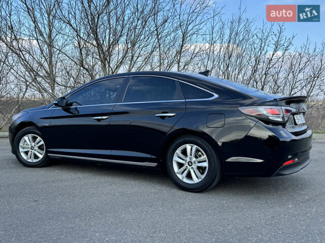 Чорний Хендай Соната, об'ємом двигуна 2 л та пробігом 74 тис. км за 12800 $, фото 2 на Automoto.ua