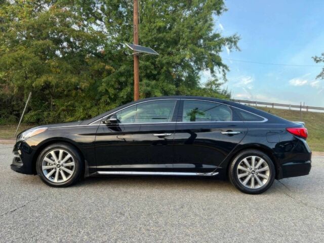 Черный Хендай Соната, объемом двигателя 2.4 л и пробегом 75 тыс. км за 8100 $, фото 7 на Automoto.ua