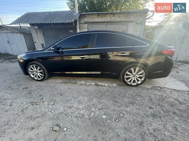 Черный Хендай Соната, объемом двигателя 2 л и пробегом 216 тыс. км за 15555 $, фото 1 на Automoto.ua