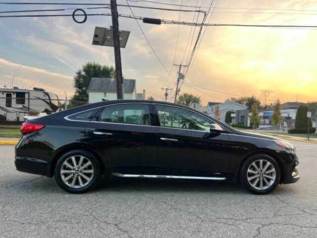 Черный Хендай Соната, объемом двигателя 2.4 л и пробегом 75 тыс. км за 8100 $, фото 3 на Automoto.ua