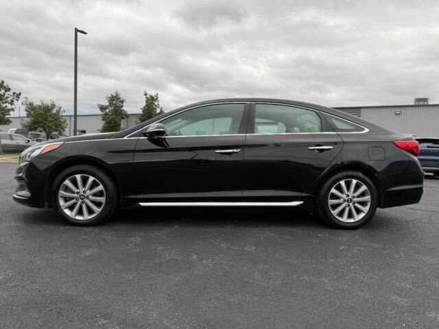 Черный Хендай Соната, объемом двигателя 2.4 л и пробегом 74 тыс. км за 1800 $, фото 3 на Automoto.ua