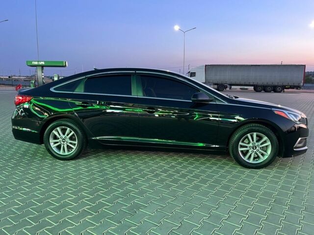 Черный Хендай Соната, объемом двигателя 2.4 л и пробегом 240 тыс. км за 10500 $, фото 1 на Automoto.ua