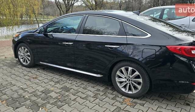 Чорний Хендай Соната, об'ємом двигуна 2.36 л та пробігом 159 тис. км за 12450 $, фото 2 на Automoto.ua