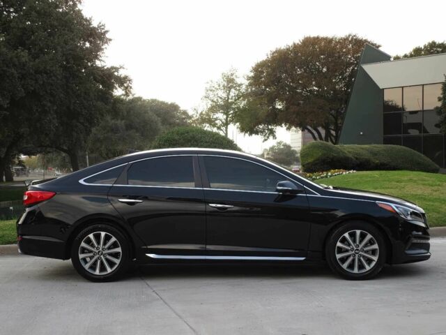 Черный Хендай Соната, объемом двигателя 2.4 л и пробегом 78 тыс. км за 2000 $, фото 4 на Automoto.ua