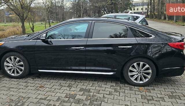 Чорний Хендай Соната, об'ємом двигуна 2.36 л та пробігом 159 тис. км за 12450 $, фото 1 на Automoto.ua