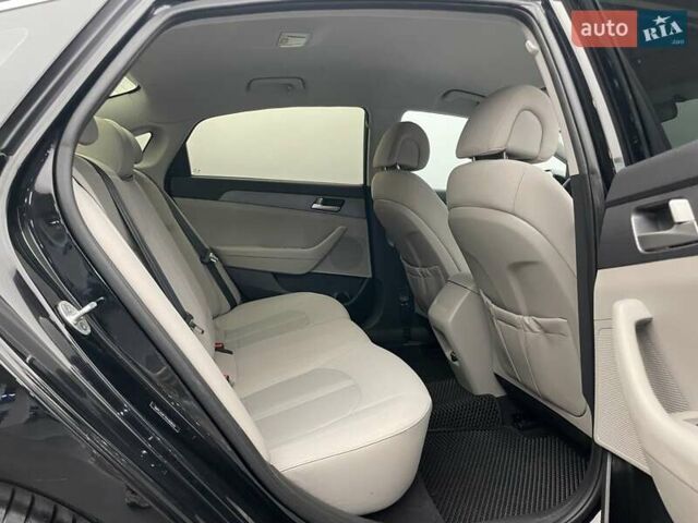 Черный Хендай Соната, объемом двигателя 2.4 л и пробегом 173 тыс. км за 10900 $, фото 10 на Automoto.ua