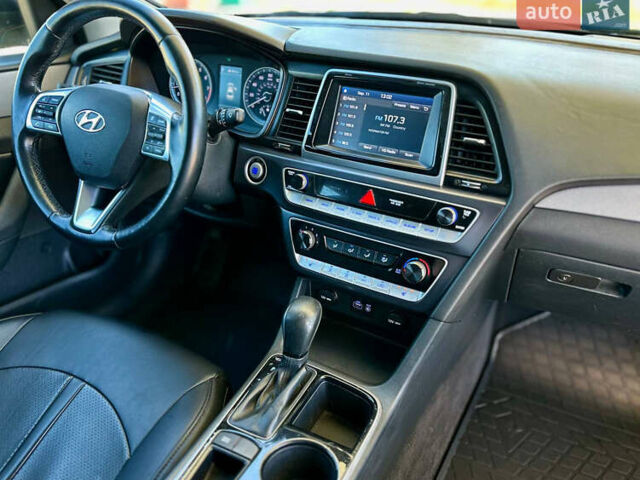 Чорний Хендай Соната, об'ємом двигуна 2.4 л та пробігом 173 тис. км за 11899 $, фото 22 на Automoto.ua