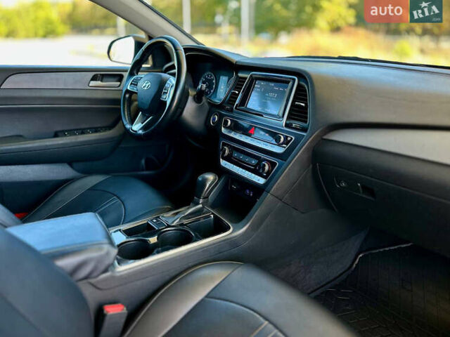 Чорний Хендай Соната, об'ємом двигуна 2.4 л та пробігом 173 тис. км за 11899 $, фото 23 на Automoto.ua