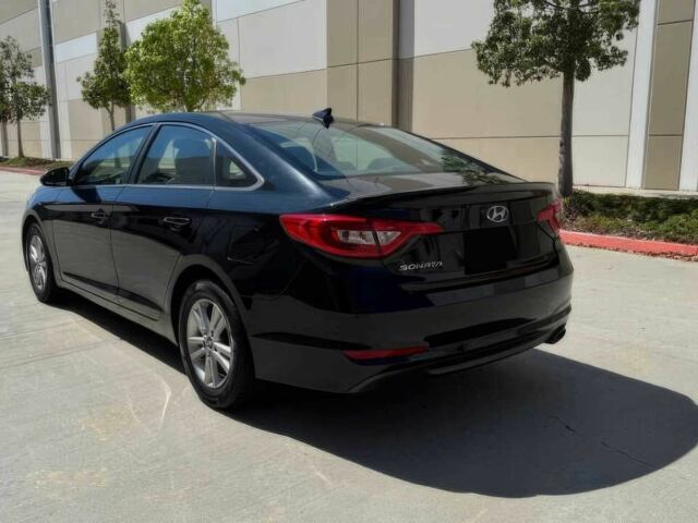 Черный Хендай Соната, объемом двигателя 2.4 л и пробегом 61 тыс. км за 7900 $, фото 5 на Automoto.ua