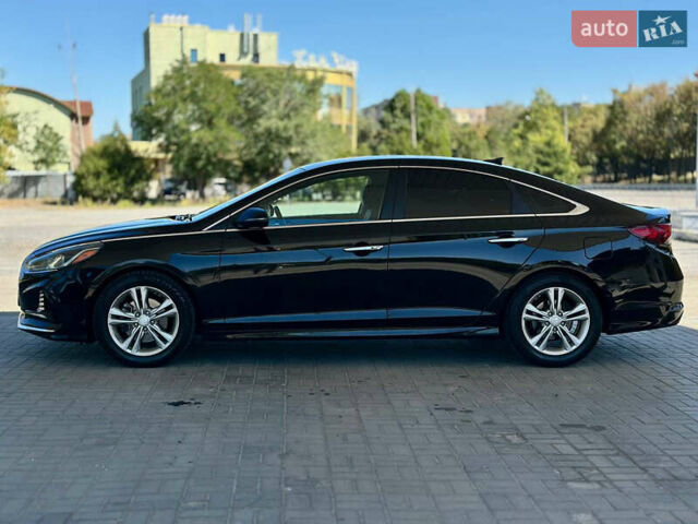 Чорний Хендай Соната, об'ємом двигуна 2.4 л та пробігом 173 тис. км за 11899 $, фото 3 на Automoto.ua