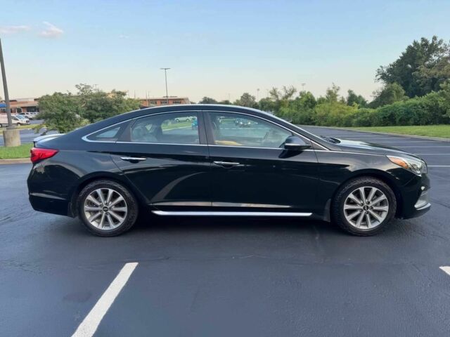 Чорний Хендай Соната, об'ємом двигуна 2.4 л та пробігом 70 тис. км за 6800 $, фото 7 на Automoto.ua