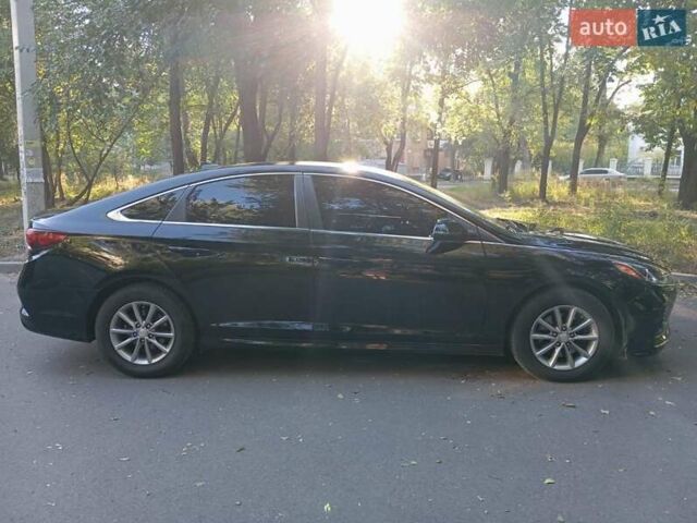 Чорний Хендай Соната, об'ємом двигуна 2.36 л та пробігом 103 тис. км за 12100 $, фото 1 на Automoto.ua