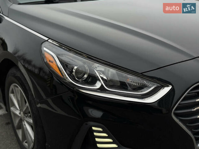 Чорний Хендай Соната, об'ємом двигуна 2.36 л та пробігом 104 тис. км за 12999 $, фото 1 на Automoto.ua