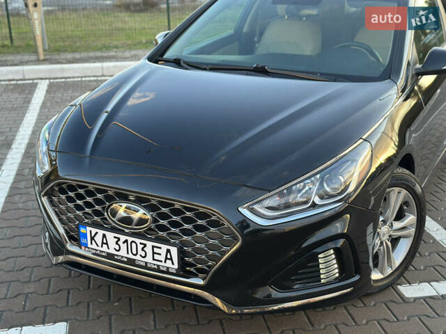 Черный Хендай Соната, объемом двигателя 2.4 л и пробегом 140 тыс. км за 13600 $, фото 2 на Automoto.ua