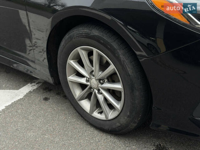 Чорний Хендай Соната, об'ємом двигуна 2.36 л та пробігом 104 тис. км за 12999 $, фото 2 на Automoto.ua