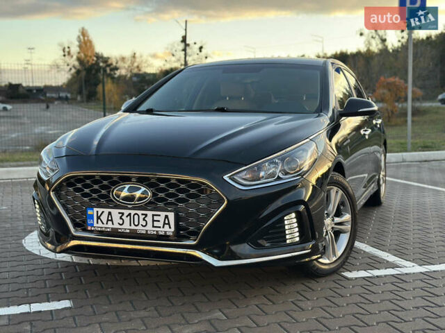 Черный Хендай Соната, объемом двигателя 2.4 л и пробегом 140 тыс. км за 13600 $, фото 1 на Automoto.ua