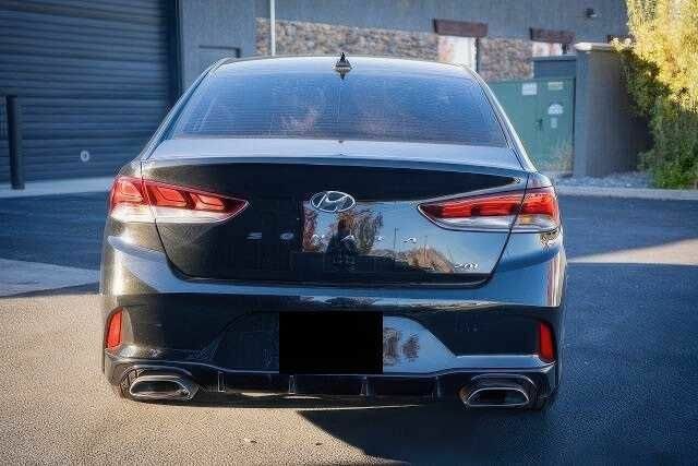 Черный Хендай Соната, объемом двигателя 2 л и пробегом 79 тыс. км за 7100 $, фото 5 на Automoto.ua