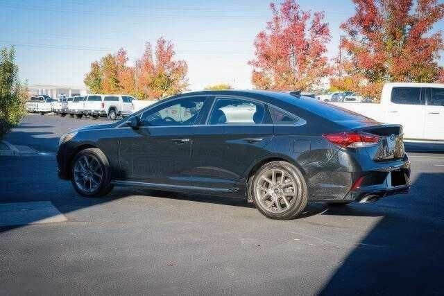 Черный Хендай Соната, объемом двигателя 2 л и пробегом 79 тыс. км за 7100 $, фото 6 на Automoto.ua