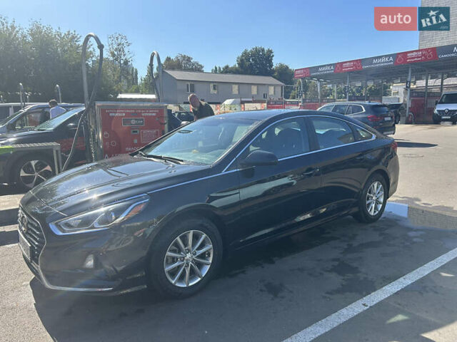 Чорний Хендай Соната, об'ємом двигуна 2.4 л та пробігом 77 тис. км за 13600 $, фото 3 на Automoto.ua