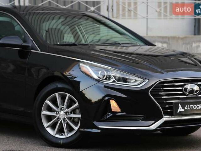 Чорний Хендай Соната, об'ємом двигуна 2.36 л та пробігом 77 тис. км за 13900 $, фото 3 на Automoto.ua