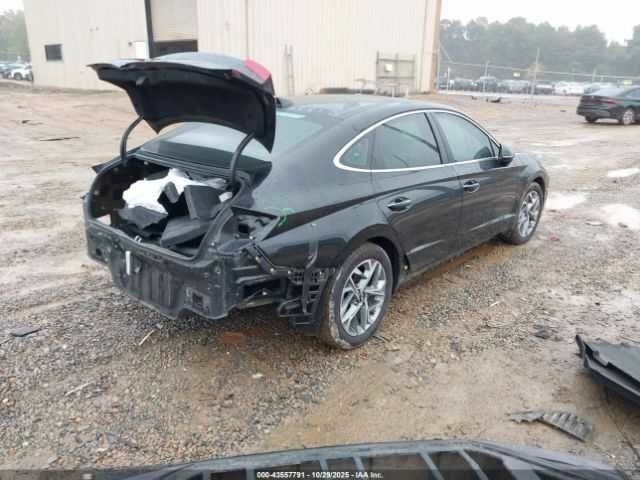 Чорний Хендай Соната, об'ємом двигуна 2.5 л та пробігом 56 тис. км за 13000 $, фото 4 на Automoto.ua