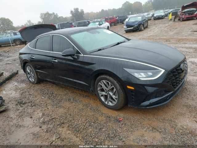 Чорний Хендай Соната, об'ємом двигуна 2.5 л та пробігом 56 тис. км за 13000 $, фото 1 на Automoto.ua