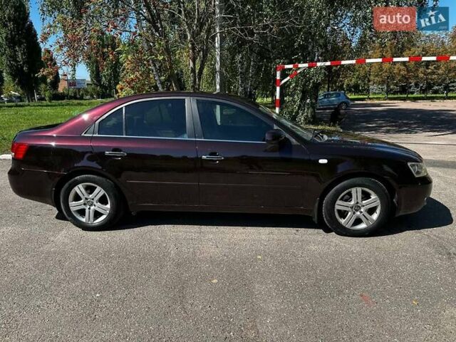 Фиолетовый Хендай Соната, объемом двигателя 2.4 л и пробегом 256 тыс. км за 4988 $, фото 5 на Automoto.ua