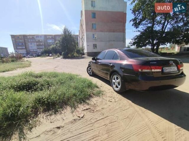 Фиолетовый Хендай Соната, объемом двигателя 2.36 л и пробегом 311 тыс. км за 6500 $, фото 5 на Automoto.ua