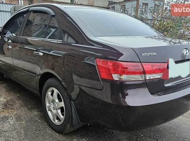 Фіолетовий Хендай Соната, об'ємом двигуна 2.4 л та пробігом 215 тис. км за 5800 $, фото 5 на Automoto.ua