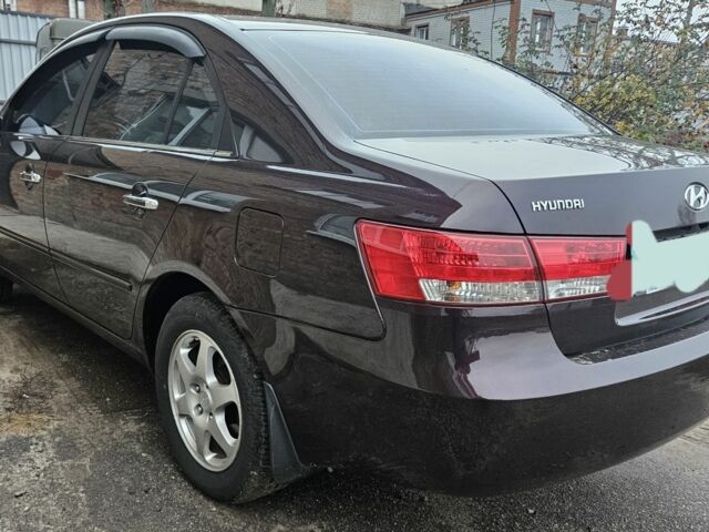 Фиолетовый Хендай Соната, объемом двигателя 2.4 л и пробегом 215 тыс. км за 5800 $, фото 4 на Automoto.ua