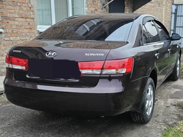 Фиолетовый Хендай Соната, объемом двигателя 2.4 л и пробегом 215 тыс. км за 5800 $, фото 2 на Automoto.ua