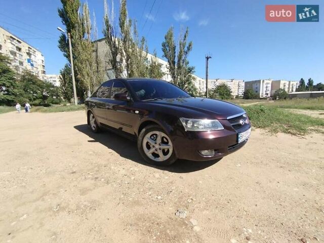 Фиолетовый Хендай Соната, объемом двигателя 2.36 л и пробегом 311 тыс. км за 6500 $, фото 4 на Automoto.ua