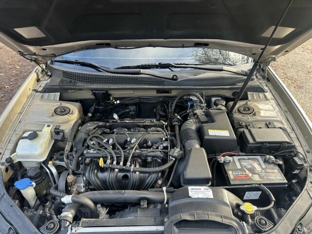 Коричневый Хендай Соната, объемом двигателя 2 л и пробегом 426 тыс. км за 5000 $, фото 9 на Automoto.ua