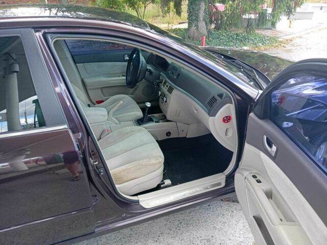 Коричневый Хендай Соната, объемом двигателя 2.4 л и пробегом 200 тыс. км за 4750 $, фото 4 на Automoto.ua