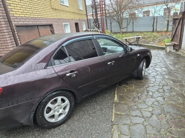 Коричневый Хендай Соната, объемом двигателя 2 л и пробегом 234 тыс. км за 4950 $, фото 4 на Automoto.ua