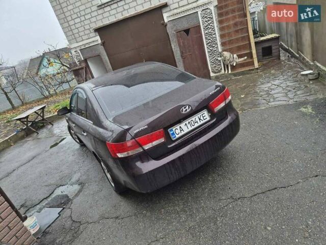 Коричневый Хендай Соната, объемом двигателя 2 л и пробегом 234 тыс. км за 4950 $, фото 4 на Automoto.ua