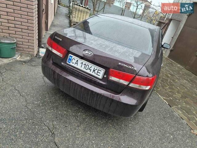 Коричневый Хендай Соната, объемом двигателя 2 л и пробегом 234 тыс. км за 4950 $, фото 5 на Automoto.ua