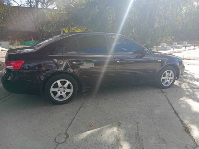 Коричневый Хендай Соната, объемом двигателя 2.4 л и пробегом 200 тыс. км за 4750 $, фото 7 на Automoto.ua