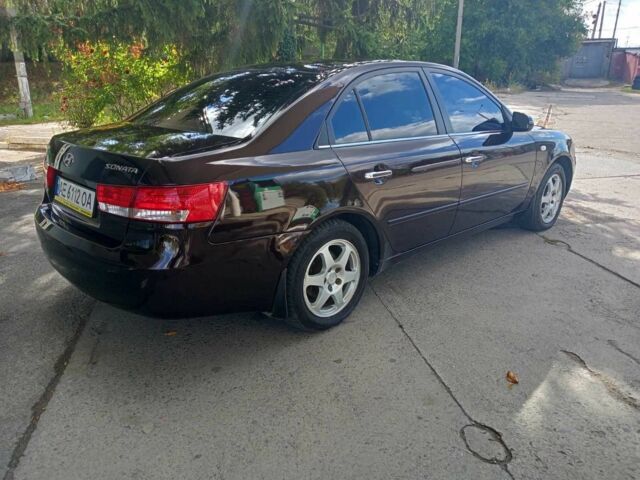 Коричневый Хендай Соната, объемом двигателя 2.4 л и пробегом 200 тыс. км за 4750 $, фото 6 на Automoto.ua