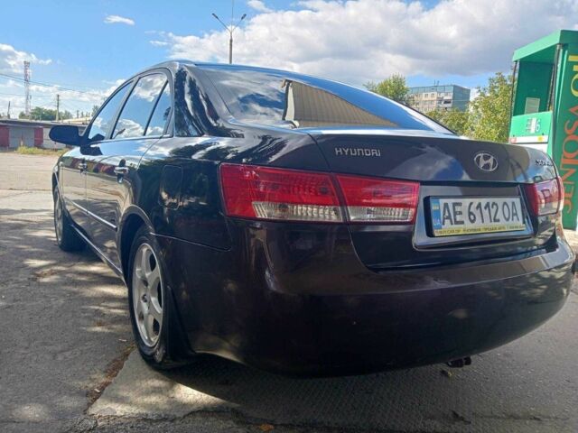 Коричневый Хендай Соната, объемом двигателя 2.4 л и пробегом 200 тыс. км за 4750 $, фото 9 на Automoto.ua