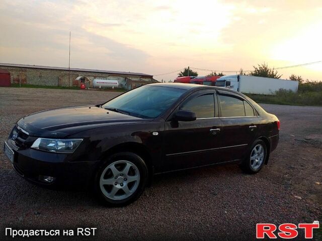 Коричневый Хендай Соната, объемом двигателя 2.4 л и пробегом 350 тыс. км за 4800 $, фото 5 на Automoto.ua