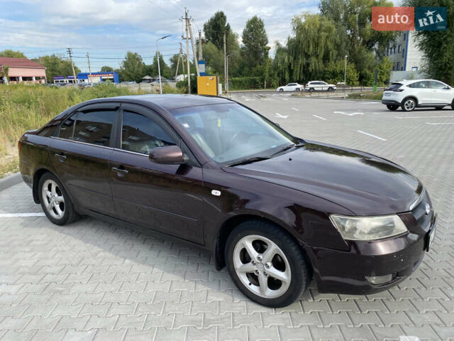 Коричневый Хендай Соната, объемом двигателя 2.36 л и пробегом 380 тыс. км за 5000 $, фото 3 на Automoto.ua