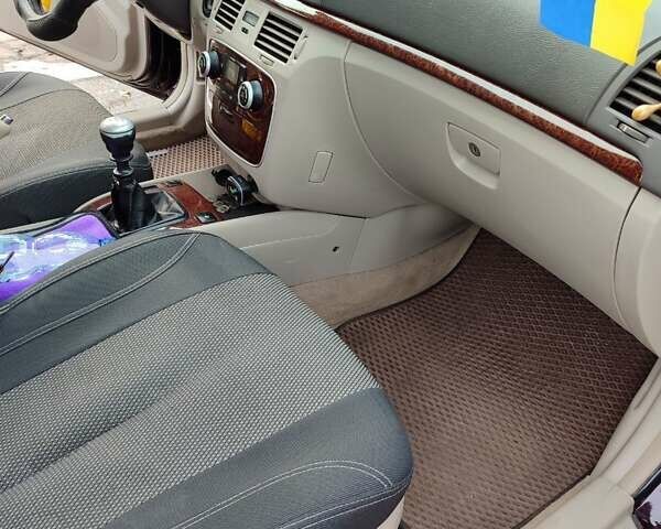 Коричневий Хендай Соната, об'ємом двигуна 2.36 л та пробігом 275 тис. км за 4800 $, фото 6 на Automoto.ua