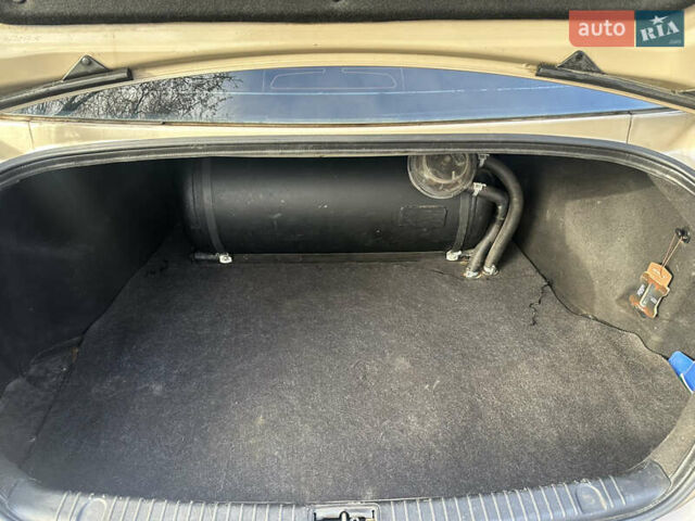Коричневый Хендай Соната, объемом двигателя 2 л и пробегом 420 тыс. км за 5000 $, фото 14 на Automoto.ua